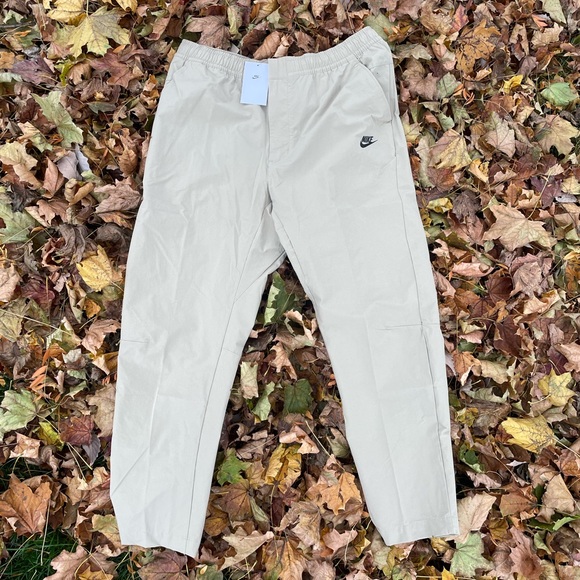 Nike Other - Men’s Nike Woven Commuter Pants Straight fit Tapered leg DM6621-247 Tan/Black